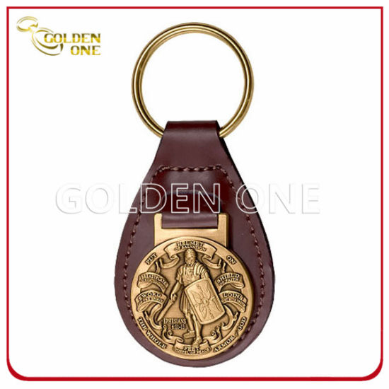 Llave de cuero personalizada FOB con émbolo en relieve de metal de latón antiguo