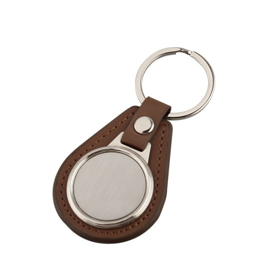 Llavero de cuero genuino de lujo con 2 anillos.